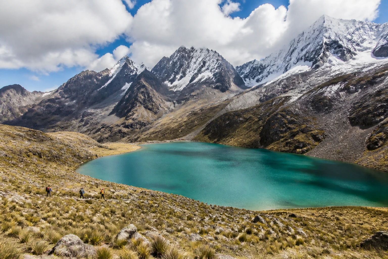 Turquoise Humantay Lake beneath rugged Andean mountains