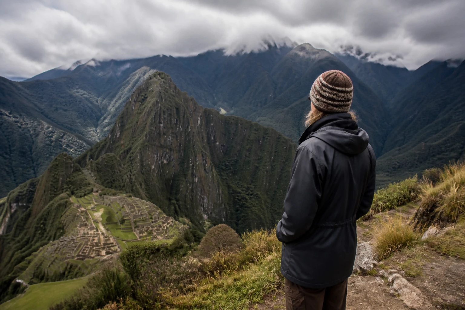 Traveler checking conditions before a mountain excursion near Cusco.