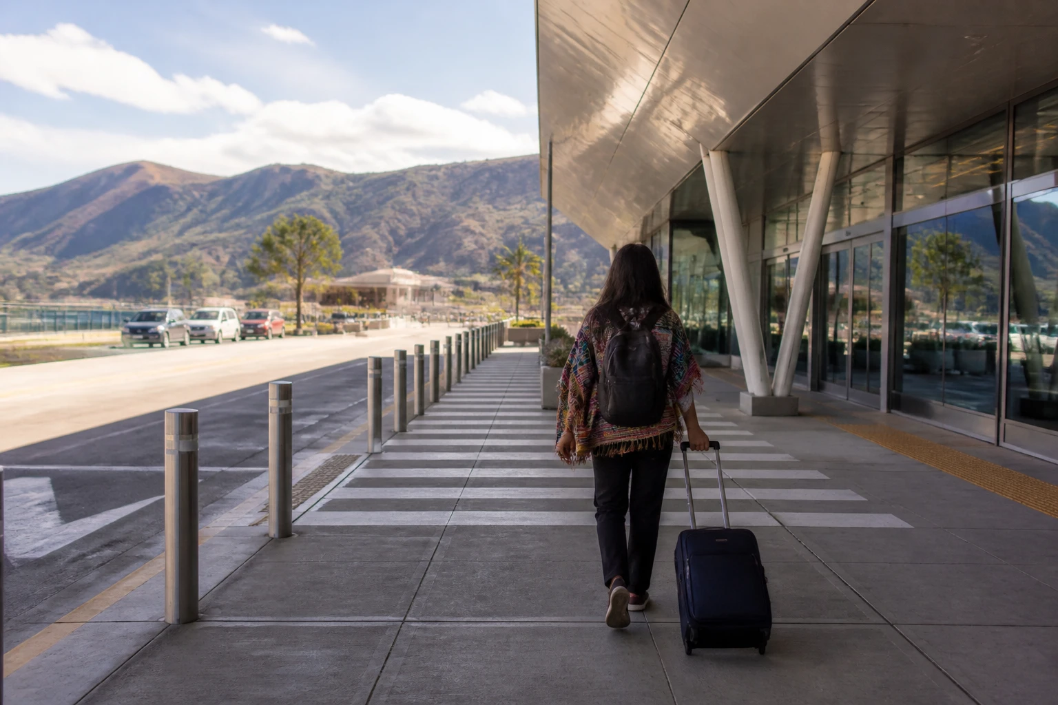 Traveler arriving at Cusco airport with luggage