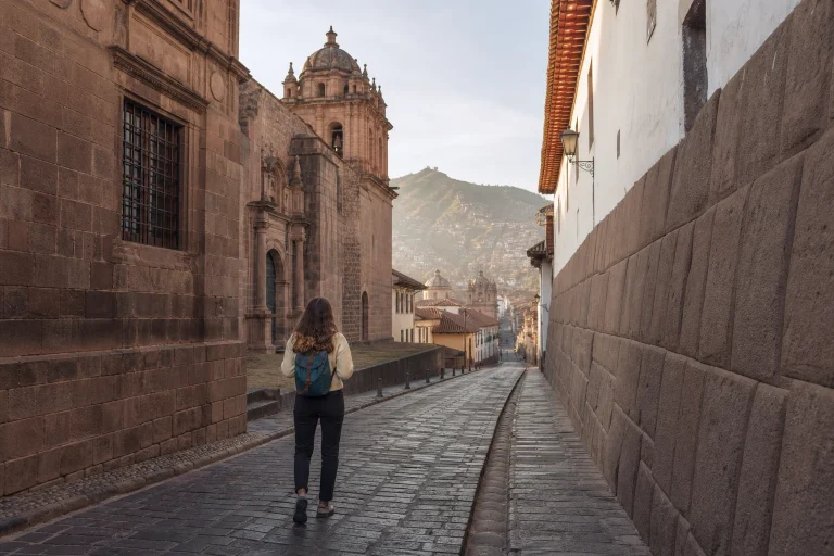 Traveler exploring Cusco on a car-free itinerary