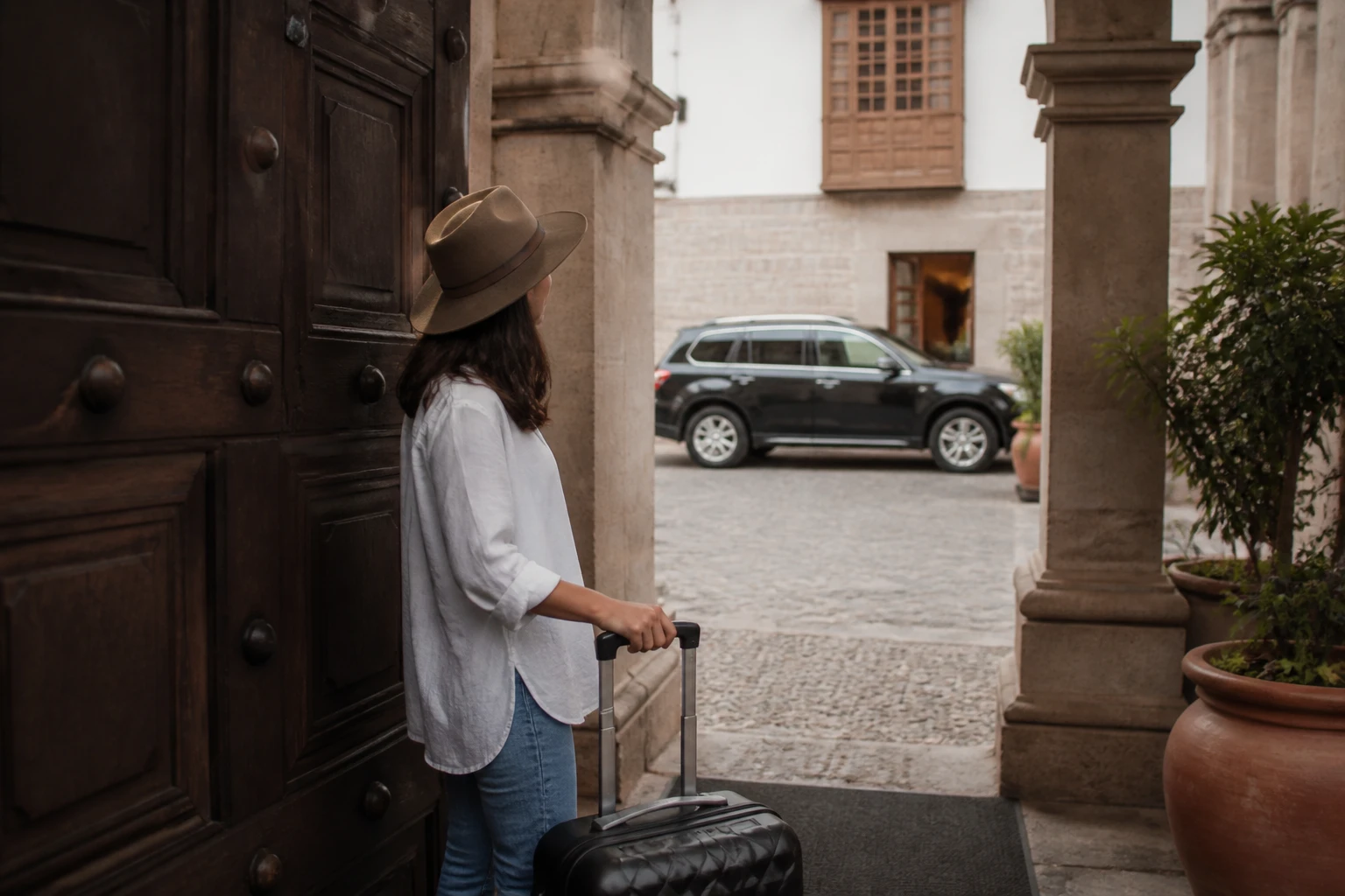 Traveler arriving at accommodation in central Cusco