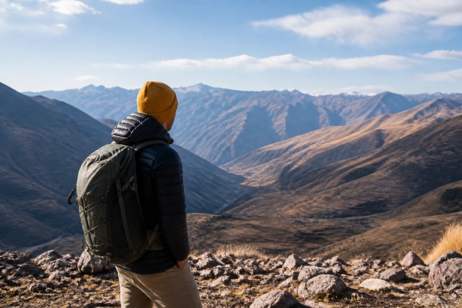 Traveler at a high Andean viewpoint near Cusco