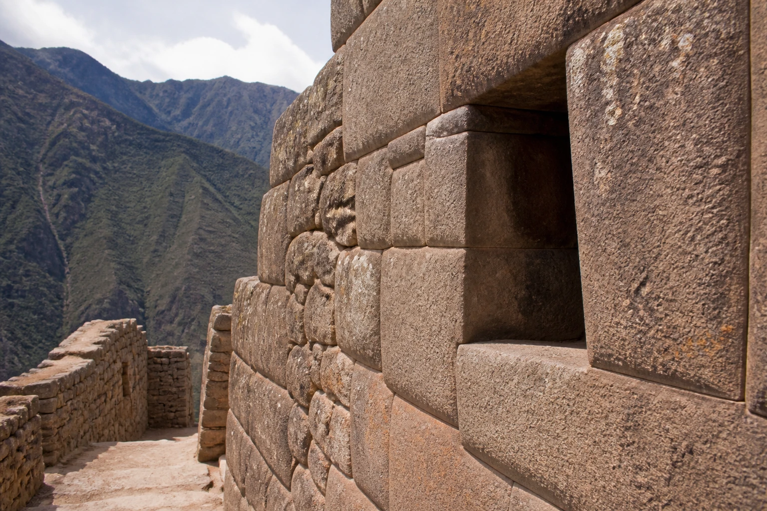 Protected stone archaeological walls at Pisaq